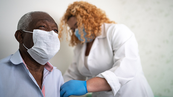 A patient is being examined by a doctor.